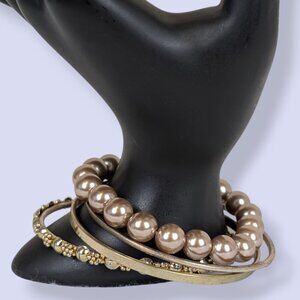 Set of 4 Gold Tone Bracelets